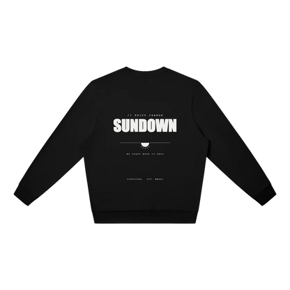 Back view of the Steelvora SUNDOWN oversized black crewneck sweatshirt featuring a bold white SUNDOWN graphic print.