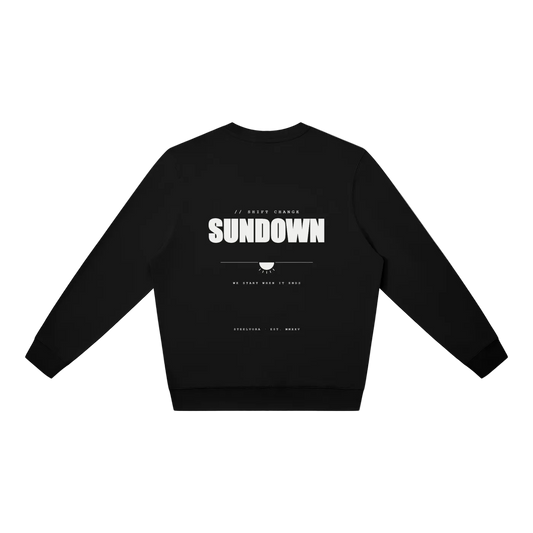 Back view of the Steelvora SUNDOWN oversized black crewneck sweatshirt featuring a bold white SUNDOWN graphic print.